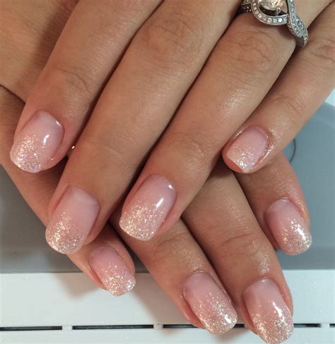 nude nails with glitter tips